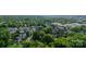 Lush green trees surround this beautiful community captured in this expansive aerial view at 2988 Textile Way, Charlotte, NC 28205