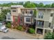 A modern townhouse with a rooftop terrace and unique architectural details at 2988 Textile Way, Charlotte, NC 28205