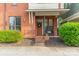 Inviting brick entryway with a wreath and well-manicured landscaping at 2988 Textile Way, Charlotte, NC 28205