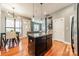 Kitchen and Dining featuring center island and hardwood floors at 2988 Textile Way, Charlotte, NC 28205