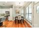 Dining area with modern lighting fixtures, and hardwood floors at 2988 Textile Way, Charlotte, NC 28205