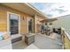 Inviting patio with comfortable seating, picnic table, and shade umbrella at 2988 Textile Way, Charlotte, NC 28205