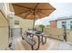 Relaxing patio area with picnic table, umbrella and city views at 2988 Textile Way, Charlotte, NC 28205