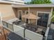 Enjoy outdoor living on this spacious rooftop deck, featuring dining and lounge area at 2988 Textile Way, Charlotte, NC 28205