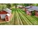Spacious backyard featuring striped-cut grass and a detached outbuilding at 326 N Greenbriar Rd, Statesville, NC 28625