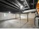 Unfinished basement with concrete floor and exposed ceiling, ready for your creative design ideas at 326 N Greenbriar Rd, Statesville, NC 28625