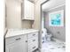 This bathroom features modern vanity with marble countertop and stylish floor tiles at 326 N Greenbriar Rd, Statesville, NC 28625
