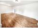 Spacious living room with hardwood floors and ample natural light throughout at 326 N Greenbriar Rd, Statesville, NC 28625