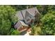 Aerial view of home showcases a well-manicured lawn, mature trees and charming exterior at 3710 Cheleys Ridge Ln, Charlotte, NC 28270