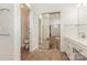 Bathroom with double vanity, tiled floors, and a separate toilet and shower area at 3710 Cheleys Ridge Ln, Charlotte, NC 28270