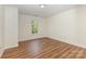 Bedroom featuring laminate flooring and neutral walls at 3710 Cheleys Ridge Ln, Charlotte, NC 28270