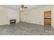 Bright living room with fireplace and tile flooring at 3710 Cheleys Ridge Ln, Charlotte, NC 28270