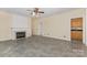 Bright living room with fireplace and tile flooring at 3710 Cheleys Ridge Ln, Charlotte, NC 28270