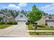 Charming home featuring a two-car garage and a well-manicured lawn at 4093 Perth Rd, Fort Mill, SC 29707