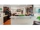 Open kitchen with island, granite countertops, and stainless steel appliances at 4093 Perth Rd, Fort Mill, SC 29707