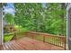 Spacious backyard deck overlooking a lush green lawn and tree-lined landscape at 427 Pinnacle Ln, Huntersville, NC 28078