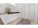 Bathroom featuring double sinks, granite countertops, and tile flooring at 440 S Sharon Amity Rd, Charlotte, NC 28211