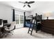 This cozy bedroom features a bunk bed, desk, and natural light from the window at 440 S Sharon Amity Rd, Charlotte, NC 28211