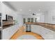 Updated kitchen with stainless steel appliances, granite countertops, and ample cabinet space at 440 S Sharon Amity Rd, Charlotte, NC 28211