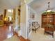 Inviting foyer showcasing hardwood floors and a staircase leading to an adjacent office space at 5076 Timber Falls Dr, Indian Land, SC 29707