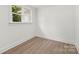 Cozy bedroom with a bright window and neutral walls, offering an inviting atmosphere at 528 W Park Dr, Monroe, NC 28112