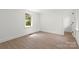 Bedroom featuring a bright window and neutral walls, creating a peaceful space at 528 W Park Dr, Monroe, NC 28112