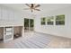 Versatile bonus room with bright light, ceiling fan, and sliding doors for easy access to backyard at 528 W Park Dr, Monroe, NC 28112