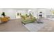 Open-concept living area featuring modern flooring, fireplace, and view of the kitchen and dining space at 528 W Park Dr, Monroe, NC 28112