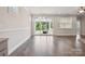 Dining room with sliders to screened porch at 6220 Raven Rock Dr, Denver, NC 28037