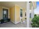 Inviting front porch with rocking chair, offering a cozy and welcoming entrance at 6220 Raven Rock Dr, Denver, NC 28037