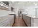 Well-equipped kitchen features a subway tile backsplash, stainless steel appliances, and granite counters at 6220 Raven Rock Dr, Denver, NC 28037