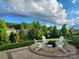 Outdoor patio with comfortable seating and lush landscaping provides the perfect setting for relaxation and entertainment at 6220 Raven Rock Dr, Denver, NC 28037