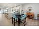 Dining area near the kitchen has a table with seating for four and stylish decor and fixtures at 6242 Ashton Park Dr, Denver, NC 28037
