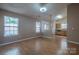 View of an open living area with a dining area and access to the kitchen at 6808 Squirrels Foot Ct, Charlotte, NC 28217
