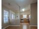 Open-concept living space featuring a combined living and dining area with kitchen access at 6808 Squirrels Foot Ct, Charlotte, NC 28217