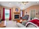 Cozy living room featuring a fireplace, comfortable seating, and neutral tones at 727 Skinner Rd, Shelby, NC 28152