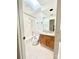 Bathroom with a shower/tub, skylight and wooden vanity at 944 Evian Ln, Matthews, NC 28015