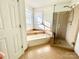 Bathroom featuring a step-up jacuzzi tub/shower room at 944 Evian Ln, Matthews, NC 28015