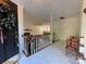 Inviting foyer with marble floors leads to a living room with fireplace and dining area at 944 Evian Ln, Matthews, NC 28015