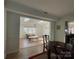 Bright living room featuring skylights, wood floors and a ceiling fan at 944 Evian Ln, Matthews, NC 28015