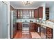 Contemporary kitchen with stainless steel appliances, granite countertops, and modern backsplash at 1000 E Woodlawn Rd # 315, Charlotte, NC 28209