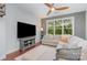 Bright living room with large windows and comfortable furnishings at 1000 E Woodlawn Rd # 315, Charlotte, NC 28209
