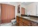 This bathroom features a granite countertop, wooden cabinets and a shower with curtain at 105 Walnut Hill Ct, Mooresville, NC 28115