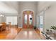 Grand foyer featuring tile flooring and a beautiful stained-glass double-door entrance at 105 Walnut Hill Ct, Mooresville, NC 28115
