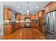 Gourmet kitchen boasting granite countertops, stainless steel appliances, and custom cabinetry at 105 Walnut Hill Ct, Mooresville, NC 28115