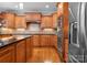 Beautiful kitchen offers stainless appliances, granite countertops and lots of storage space at 105 Walnut Hill Ct, Mooresville, NC 28115
