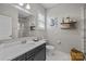 Bright bathroom with a large vanity, stylish mirror, and a glass-enclosed shower at 10517 Sable Cap Rd, Mint Hill, NC 28227