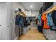 Walk-in closet featuring built-in shelving and ample storage space for clothes and luggage at 10517 Sable Cap Rd, Mint Hill, NC 28227