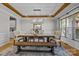 Elegant dining room with hardwood floors, wooden beams, and stylish decor at 10517 Sable Cap Rd, Mint Hill, NC 28227
