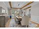Well-lit dining room with hardwood floors, decor and lots of natural light at 10517 Sable Cap Rd, Mint Hill, NC 28227